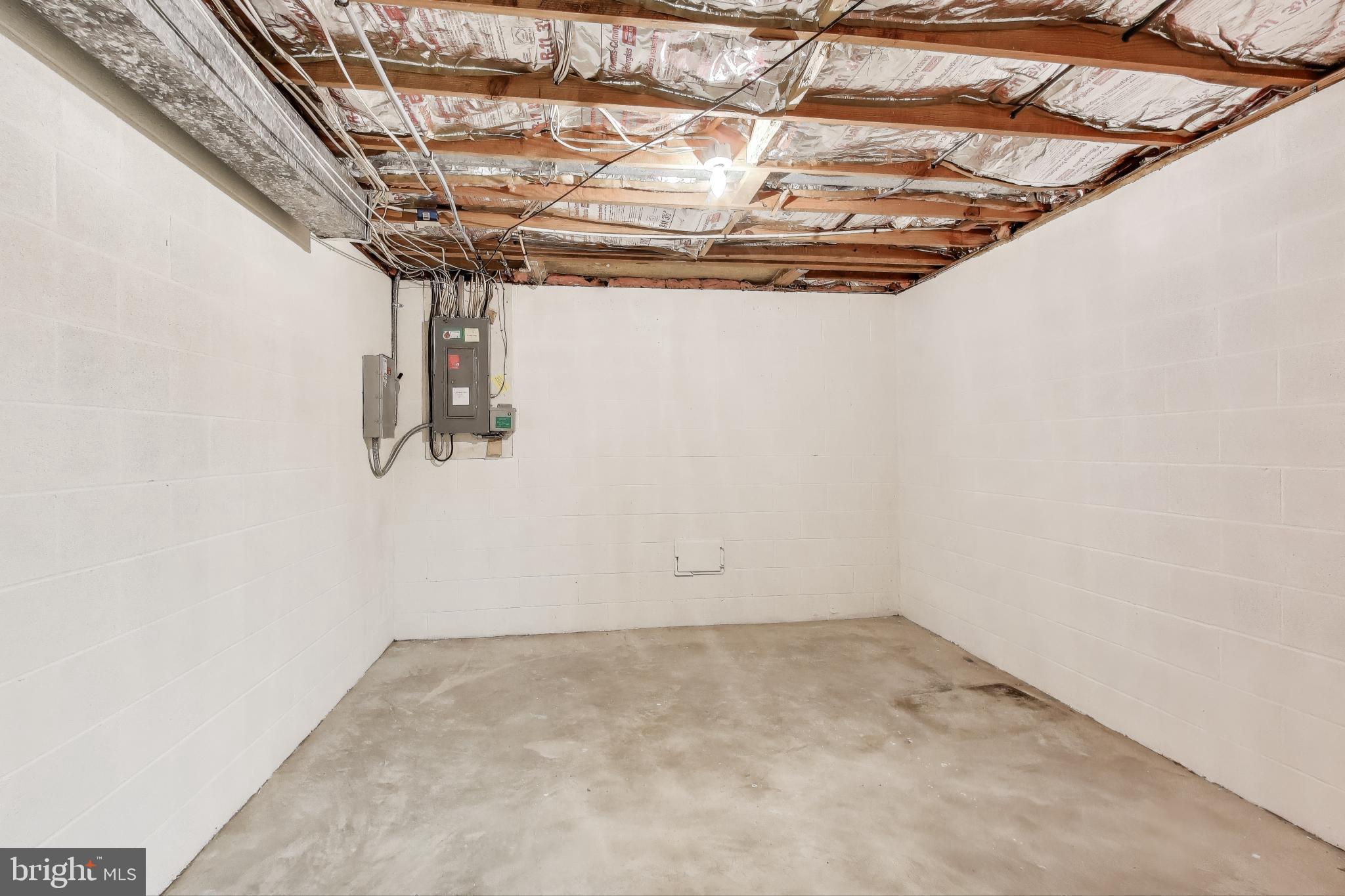 9201 Centerway Road Gaithersburg, MD 20879 - Photo 36 of 53 a view of a room with racks on the wall