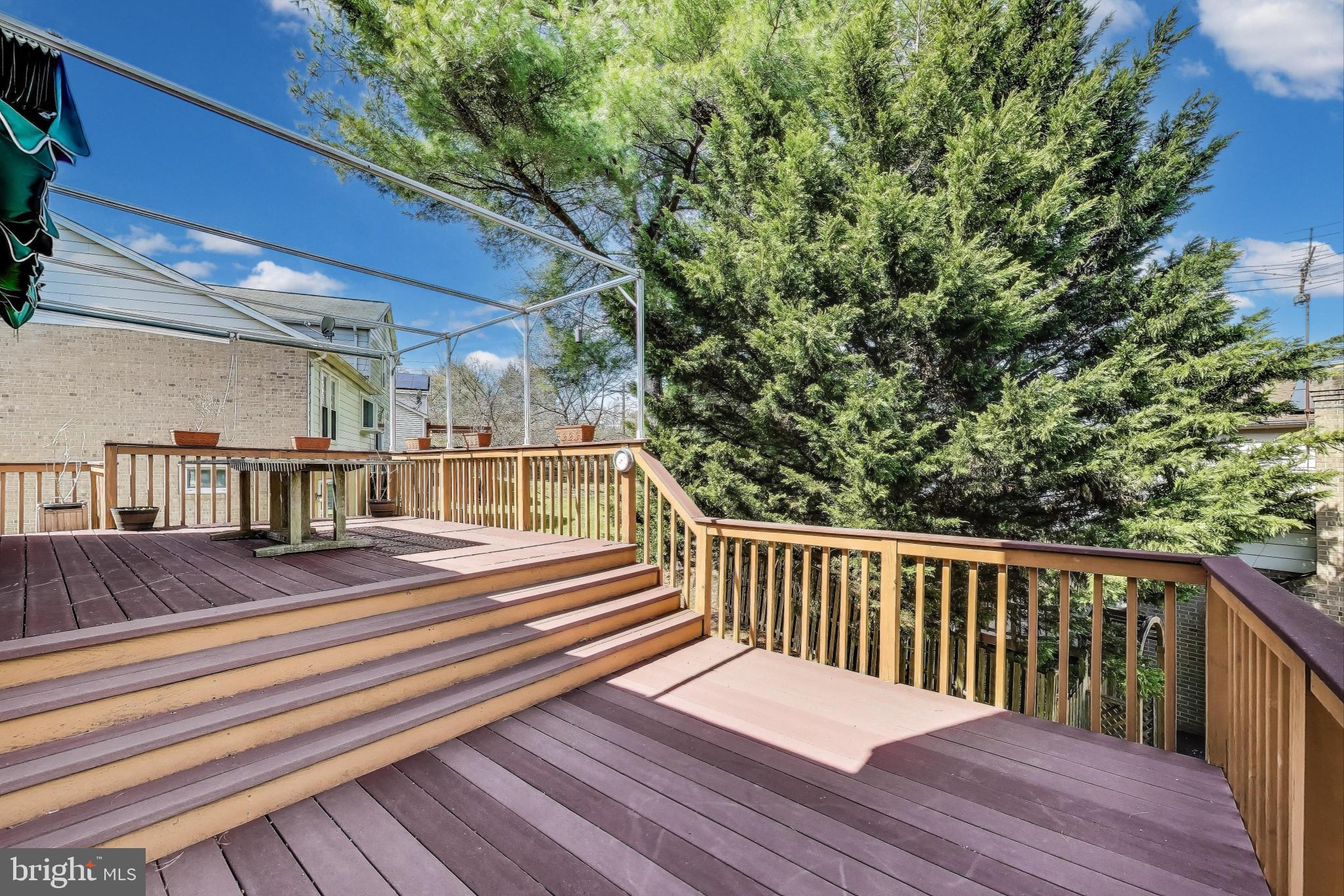 9201 Centerway Road Gaithersburg, MD 20879 - Photo 37 of 53 a view of balcony with wooden floor and fence