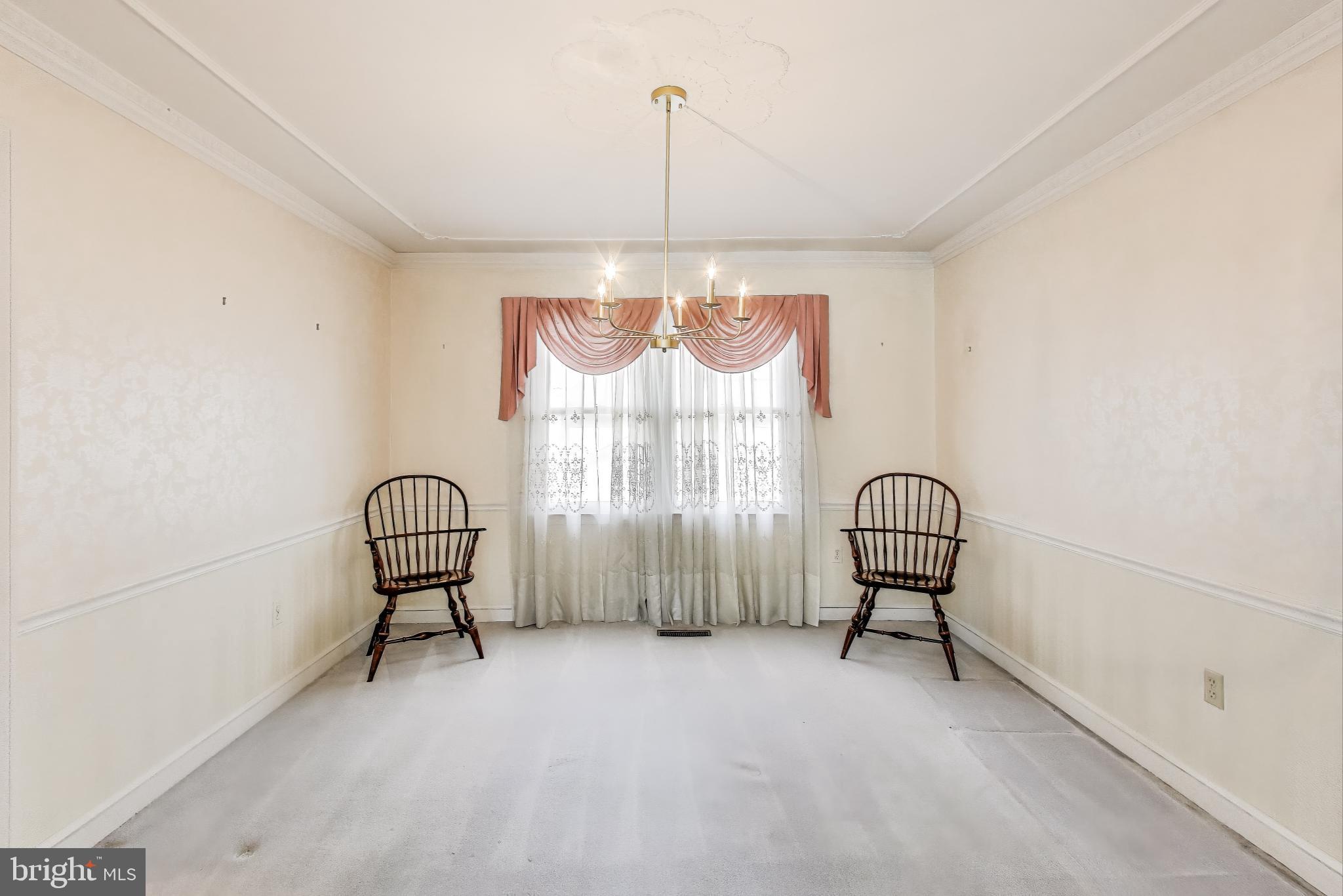 9201 Centerway Road Gaithersburg, MD 20879 - Photo 6 of 53 a view of entryway with window and chandelier