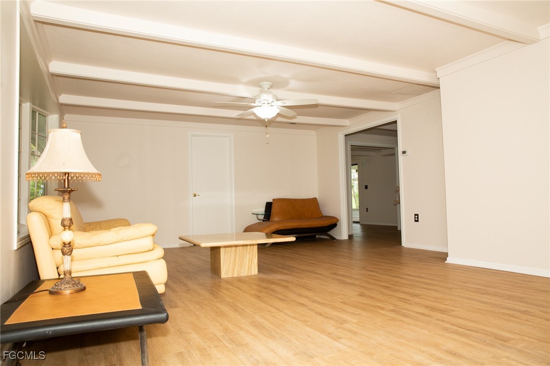 4055 County Road 78 Fort Denaud, FL 33935 - Photo 13 of 28 a living room with furniture and a table