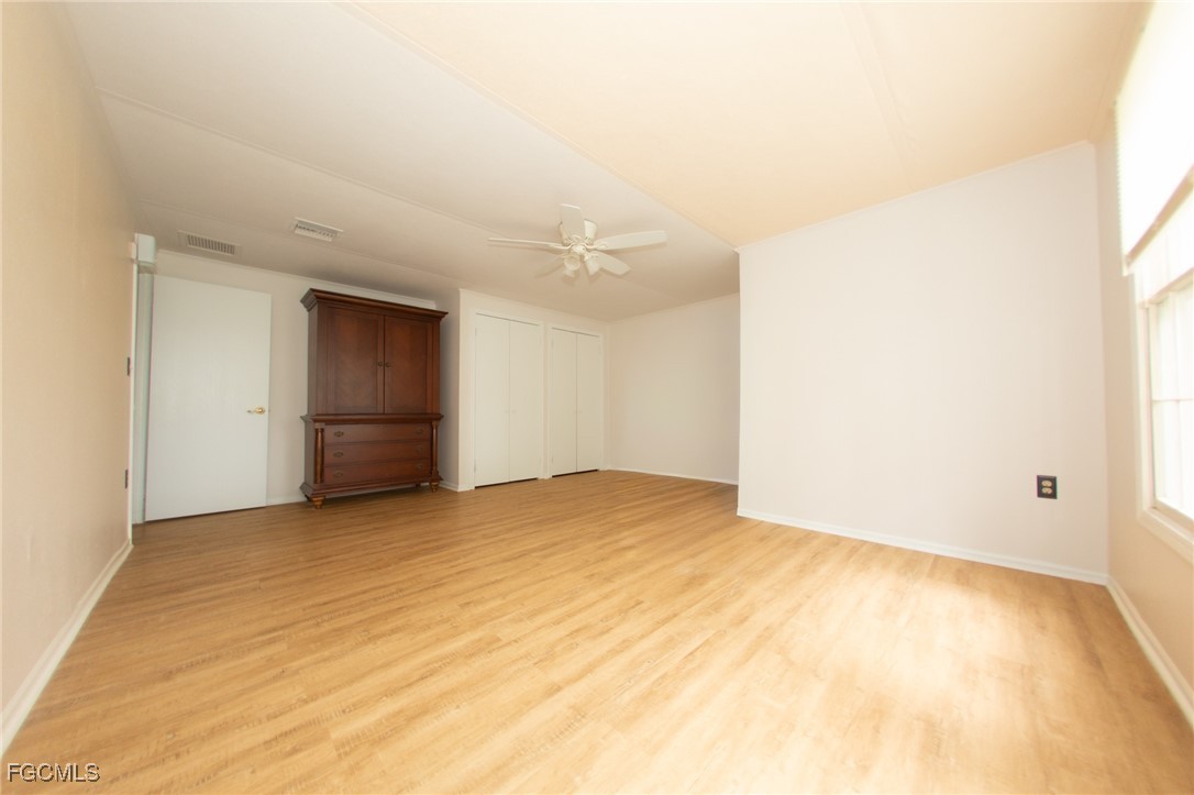 4055 County Road 78 Fort Denaud, FL 33935 - Photo 21 of 28 an empty room with a natural light