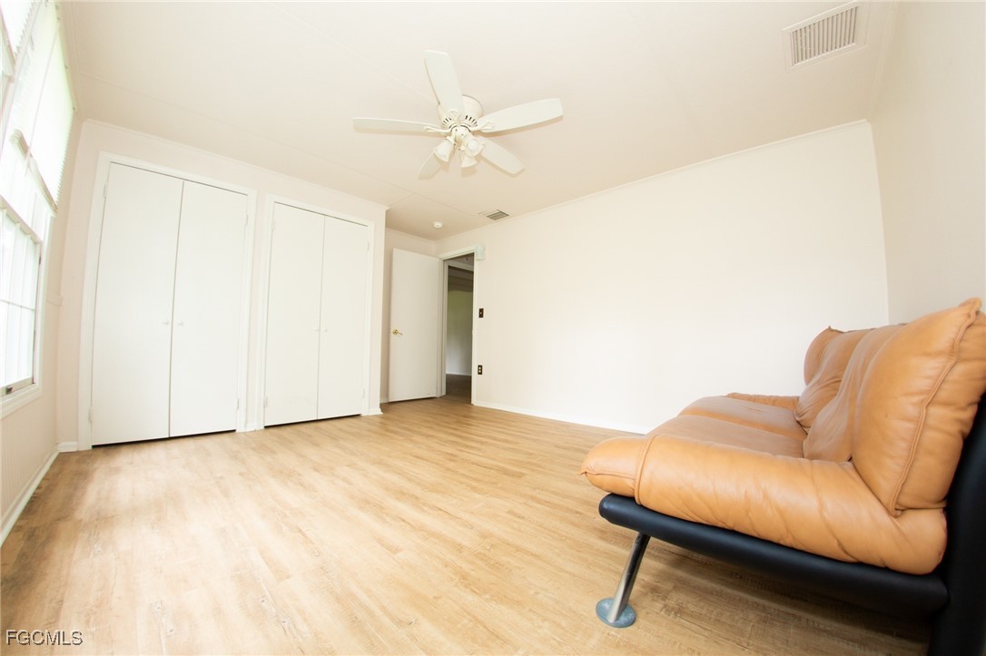 4055 County Road 78 Fort Denaud, FL 33935 - Photo 22 of 28 a view of livingroom with furniture and ceiling fan