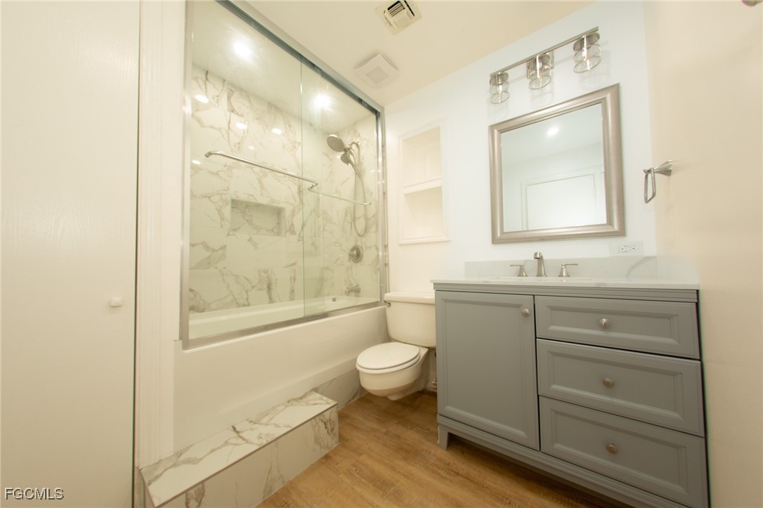 4055 County Road 78 Fort Denaud, FL 33935 - Photo 23 of 28 a bathroom with a granite countertop sink toilet and shower