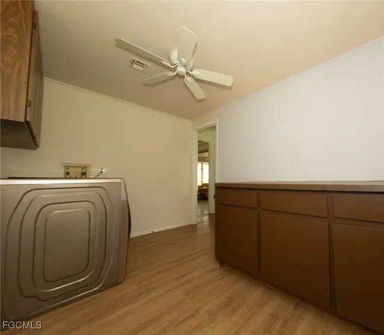 a view of a livingroom with wooden floor