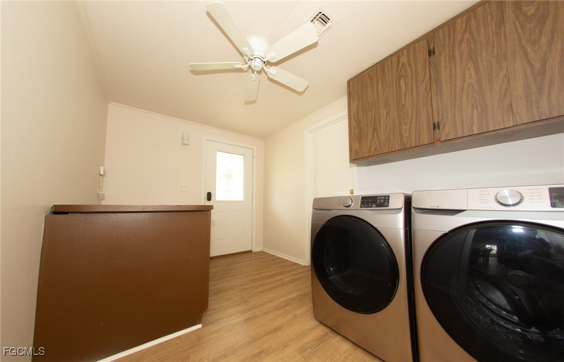 4055 County Road 78 Fort Denaud, FL 33935 - Photo 25 of 28 a utility room with dryer and washer