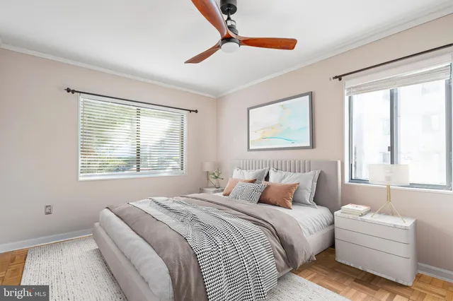 a bedroom with bed and window