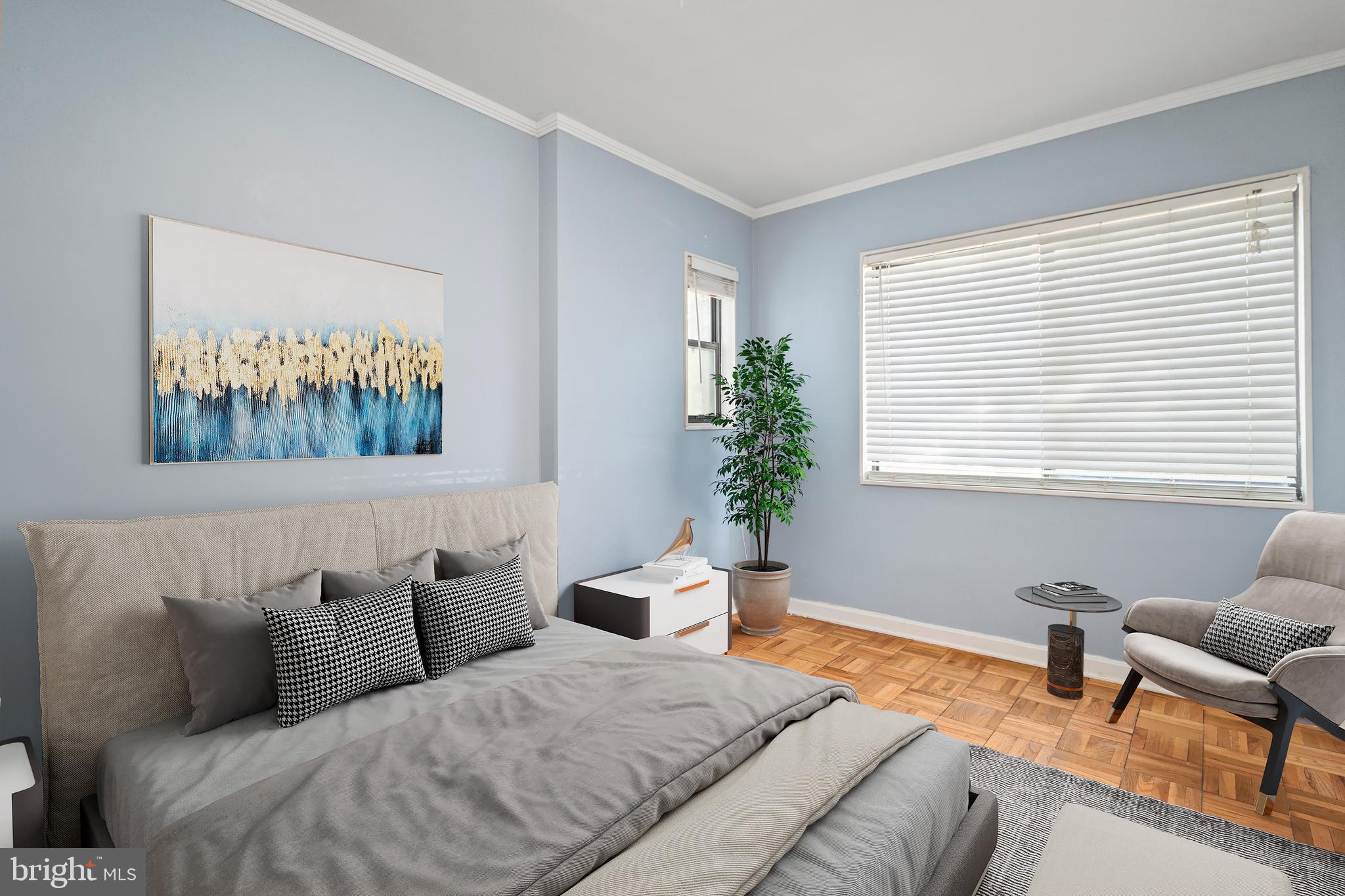 3825 Davis Place Northwest, Unit 103 Washington, DC 20007 - Photo 13 of 26 a bedroom with a bed and a window