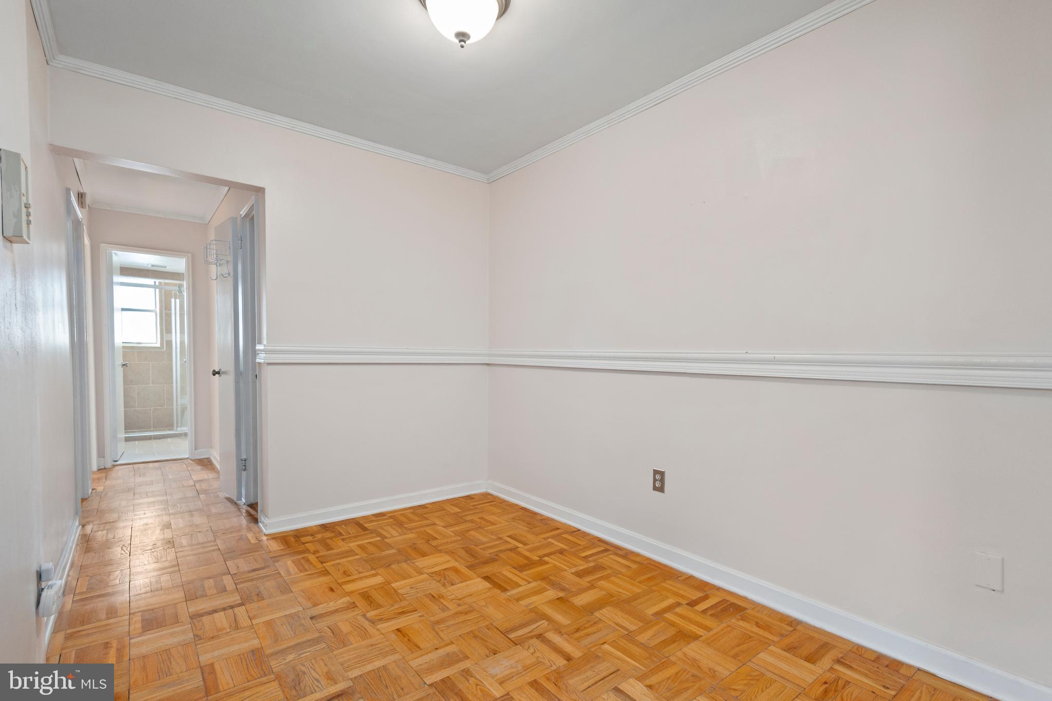 3825 Davis Place Northwest, Unit 103 Washington, DC 20007 - Photo 9 of 26 a view of a room with an empty space