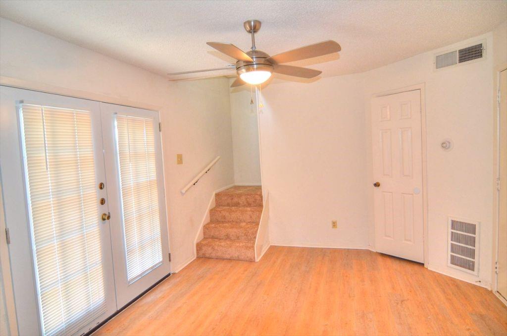 6503 Ridgecrest Road, Unit 110/J Dallas, TX 75231 - Photo 8 of 10 a view of an empty room with a window