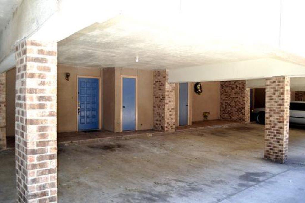 6503 Ridgecrest Road, Unit 110/J Dallas, TX 75231 - Photo 10 of 10 a view of livingroom with stairs