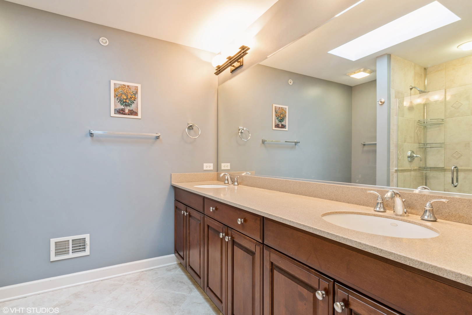 13 Busse Highway Park Ridge, IL 60068 - Photo 12 of 28 a bathroom with a granite countertop sink a mirror and a shower
