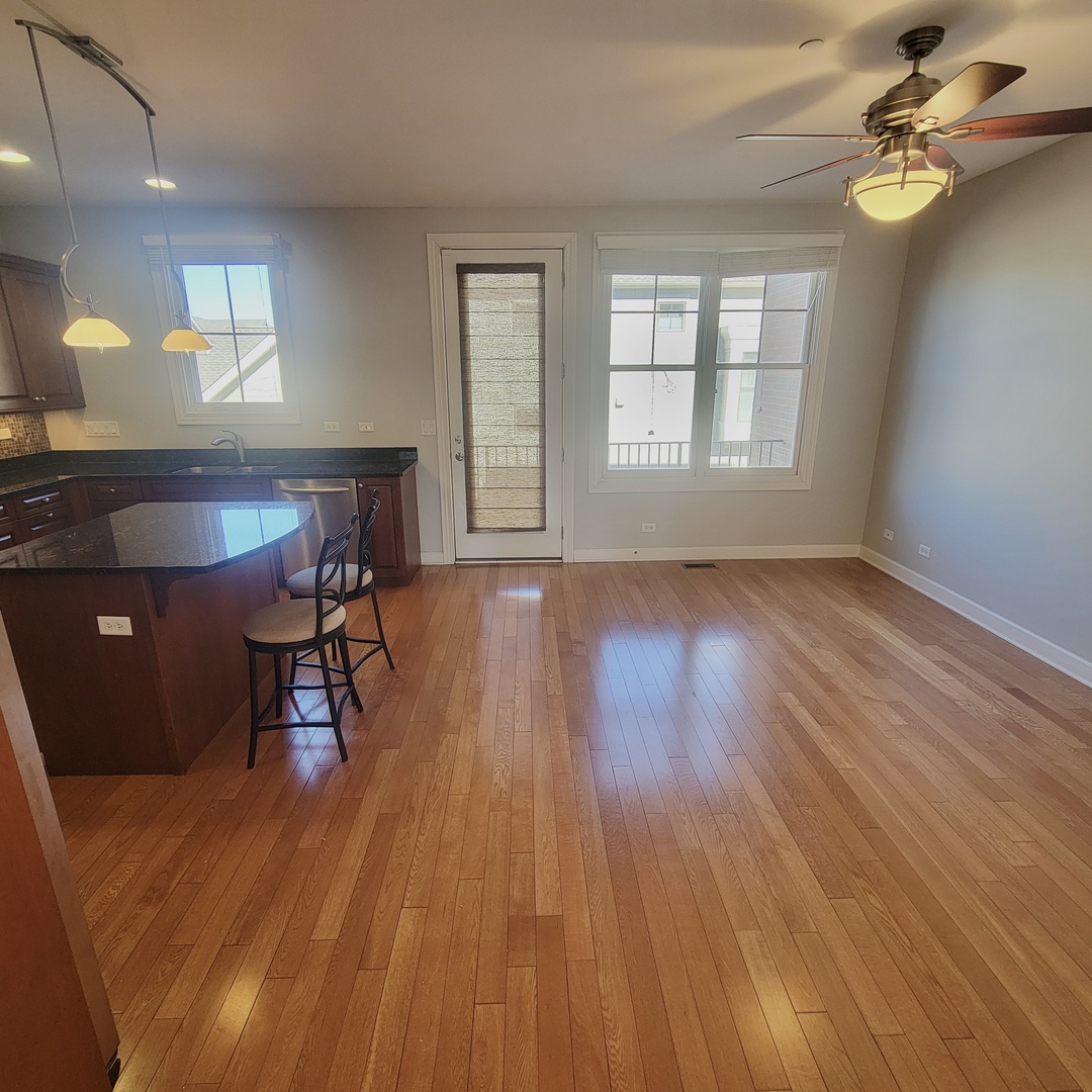 13 Busse Highway Park Ridge, IL 60068 - Photo 7 of 28 a view of a room with furniture and a window