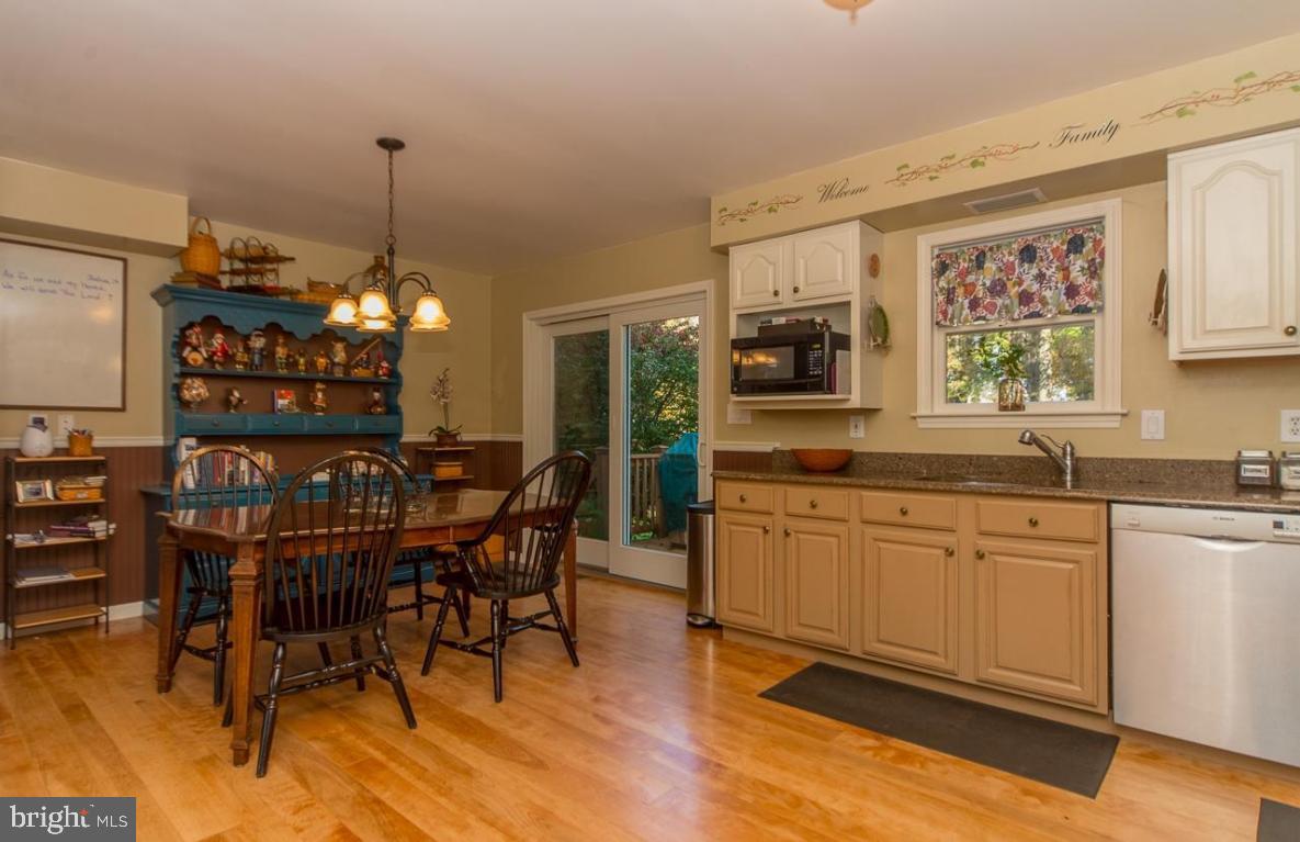 3 Oak Road Kirkwood, PA 17536 - Photo 14 of 33 a kitchen with stainless steel appliances granite countertop a table chairs sink and cabinets