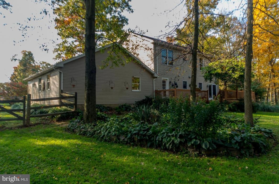 3 Oak Road Kirkwood, PA 17536 - Photo 5 of 33 a view of backyard with potted plants and a large tree