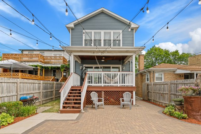 Undisclosed Address Chicago, IL 60634 - Photo 33 of 44 a front view of a house with windows
