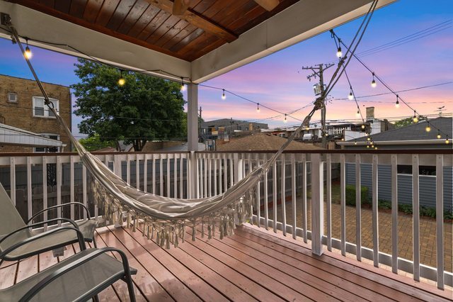 Undisclosed Address Chicago, IL 60634 - Photo 40 of 44 a view of balcony with wooden floor