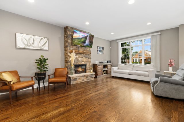 Undisclosed Address Chicago, IL 60634 - Photo 4 of 44 a living room with furniture and a large window