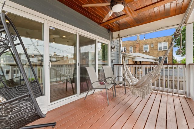 Undisclosed Address Chicago, IL 60634 - Photo 41 of 44 a view of a balcony with furniture
