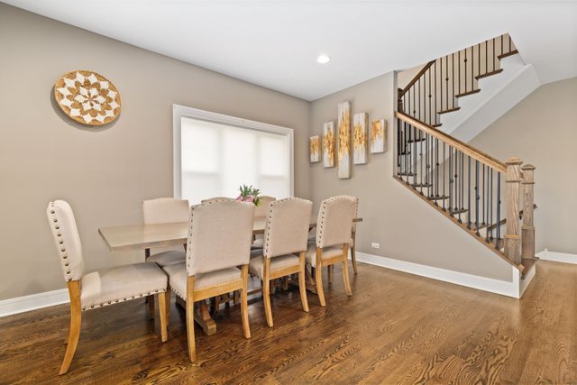 Undisclosed Address Chicago, IL 60634 - Photo 8 of 44 a view of a dining room with furniture wooden floor and a window