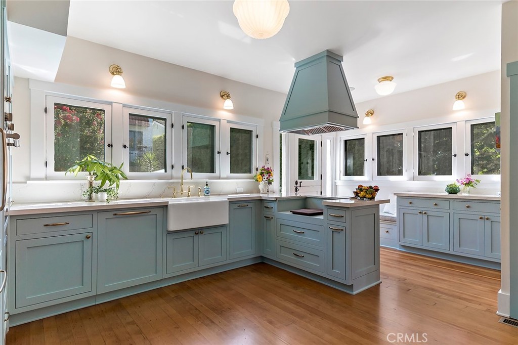 3216 2nd Street Long Beach, CA 90803 - Photo 19 of 62 a kitchen with sink cabinets and wooden floor