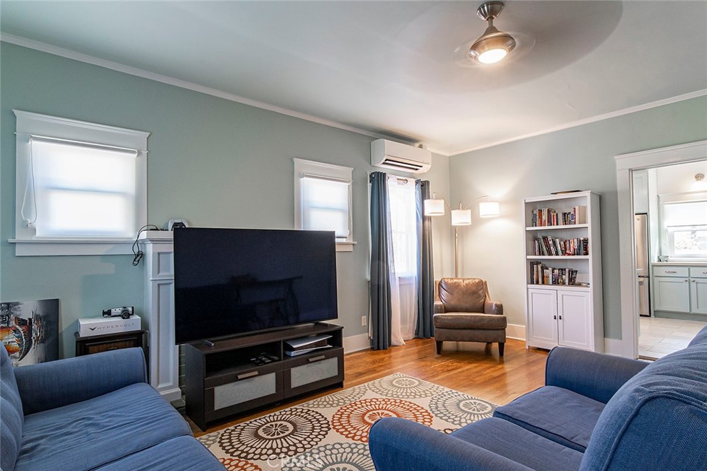 3216 2nd Street Long Beach, CA 90803 - Photo 47 of 62 a living room with furniture and a flat screen tv