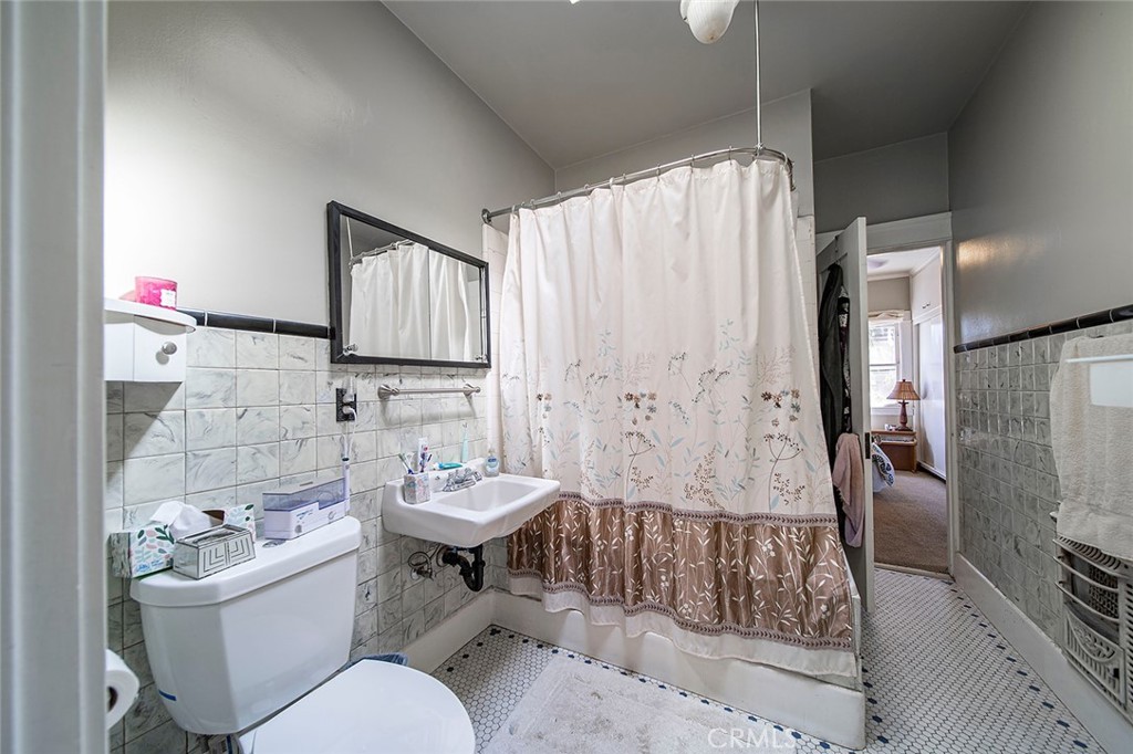 3216 2nd Street Long Beach, CA 90803 - Photo 57 of 62 a bathroom with a sink toilet and shower