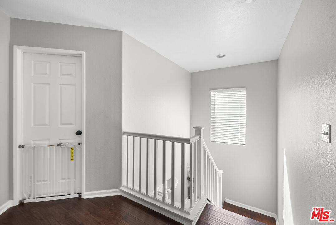 40335 Reata Road Palmdale, CA 93550 - Photo 15 of 37 a view of a hallway with entryway door