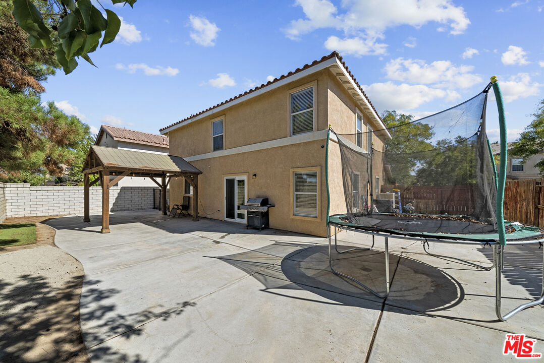 40335 Reata Road Palmdale, CA 93550 - Photo 30 of 37 a house view with a outdoor space