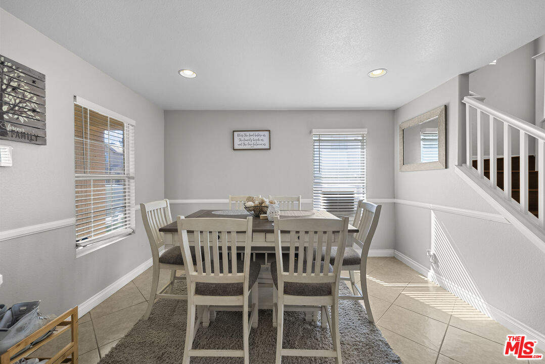 40335 Reata Road Palmdale, CA 93550 - Photo 3 of 37 a view of a dining room with furniture and window