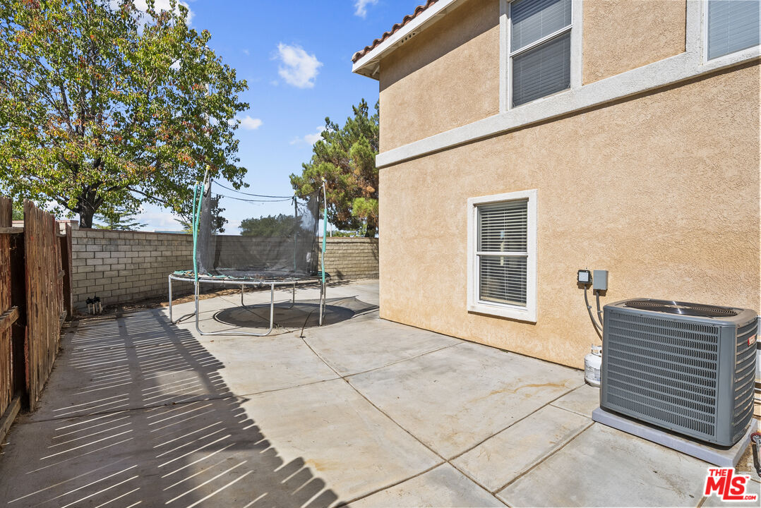 40335 Reata Road Palmdale, CA 93550 - Photo 33 of 37 a view of a patio with chairs and plants