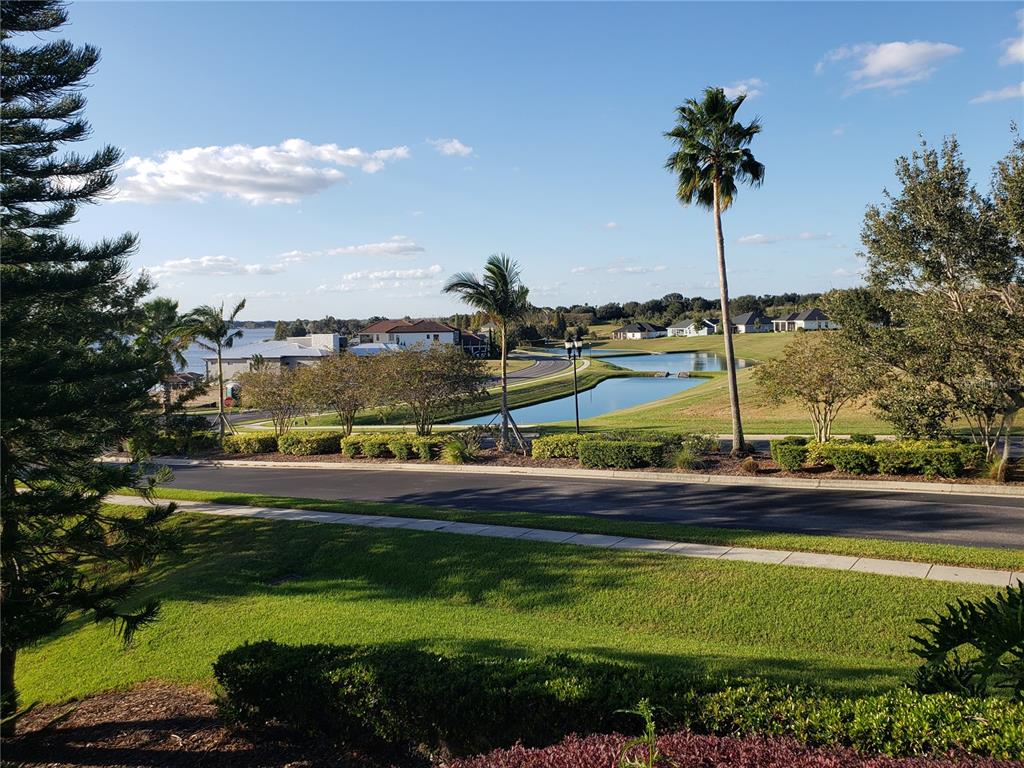 412 Adams View Lane Auburndale, FL 33823 - Photo 19 of 21 a view of a swimming pool and trees in the background