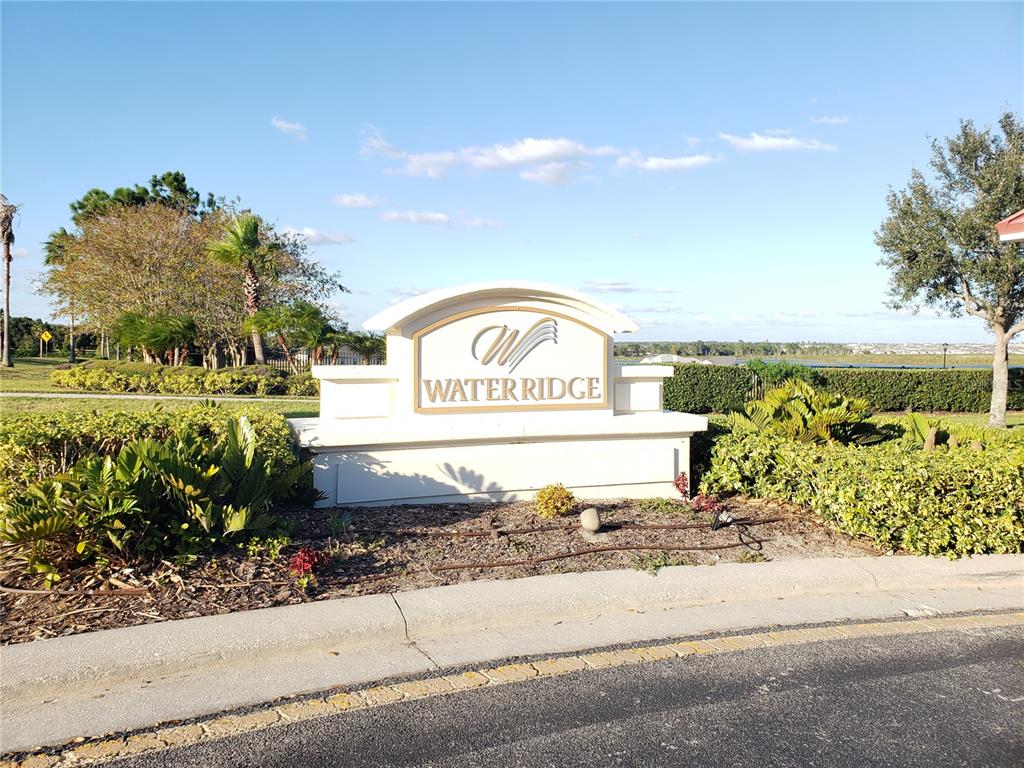 412 Adams View Lane Auburndale, FL 33823 - Photo 21 of 21 a sign that is on the side of a street