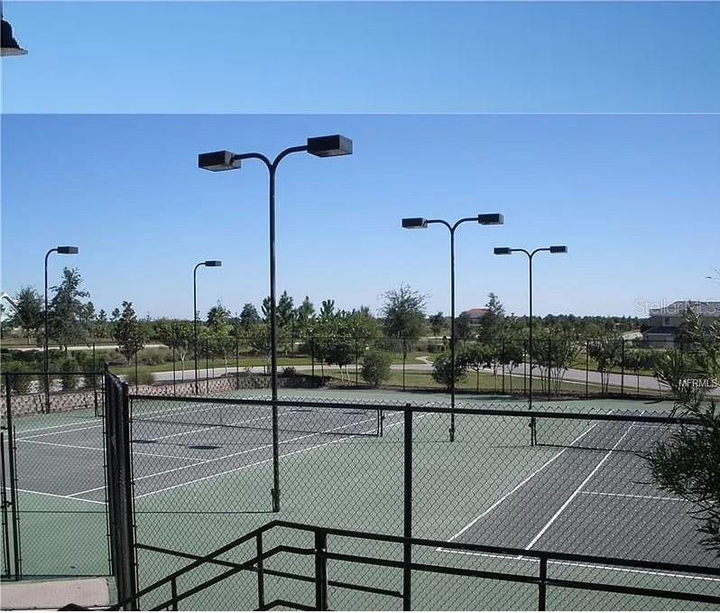 412 Adams View Lane Auburndale, FL 33823 - Photo 5 of 21 a view of a tennis court
