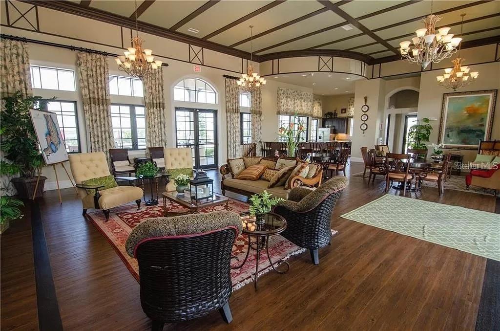412 Adams View Lane Auburndale, FL 33823 - Photo 8 of 21 a living room with furniture large window and wooden floor