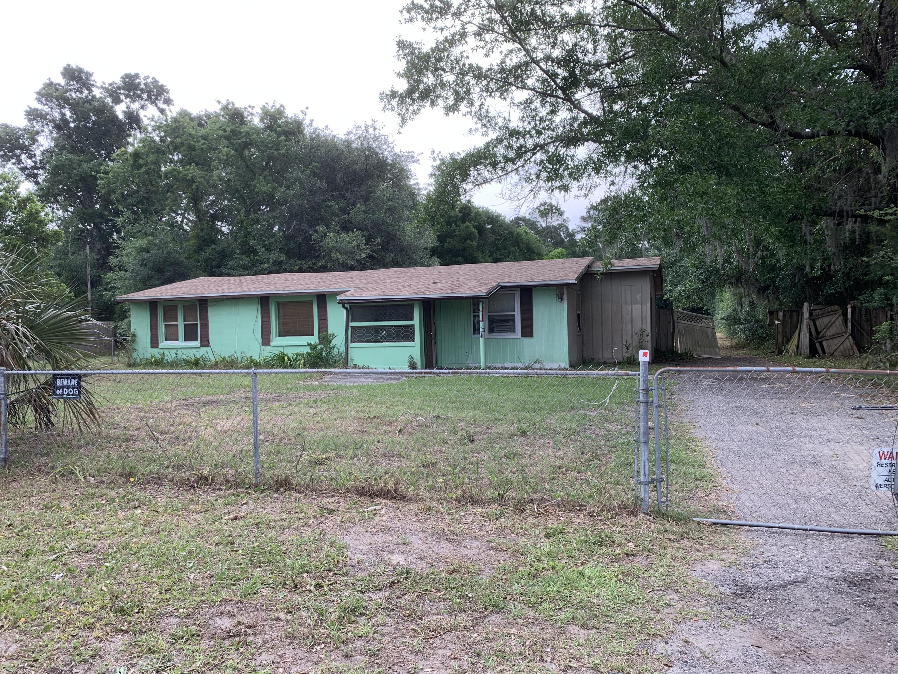 211 Jackson Road Jacksonville, FL 32225 - Photo 4 of 16 a view of house with a yard