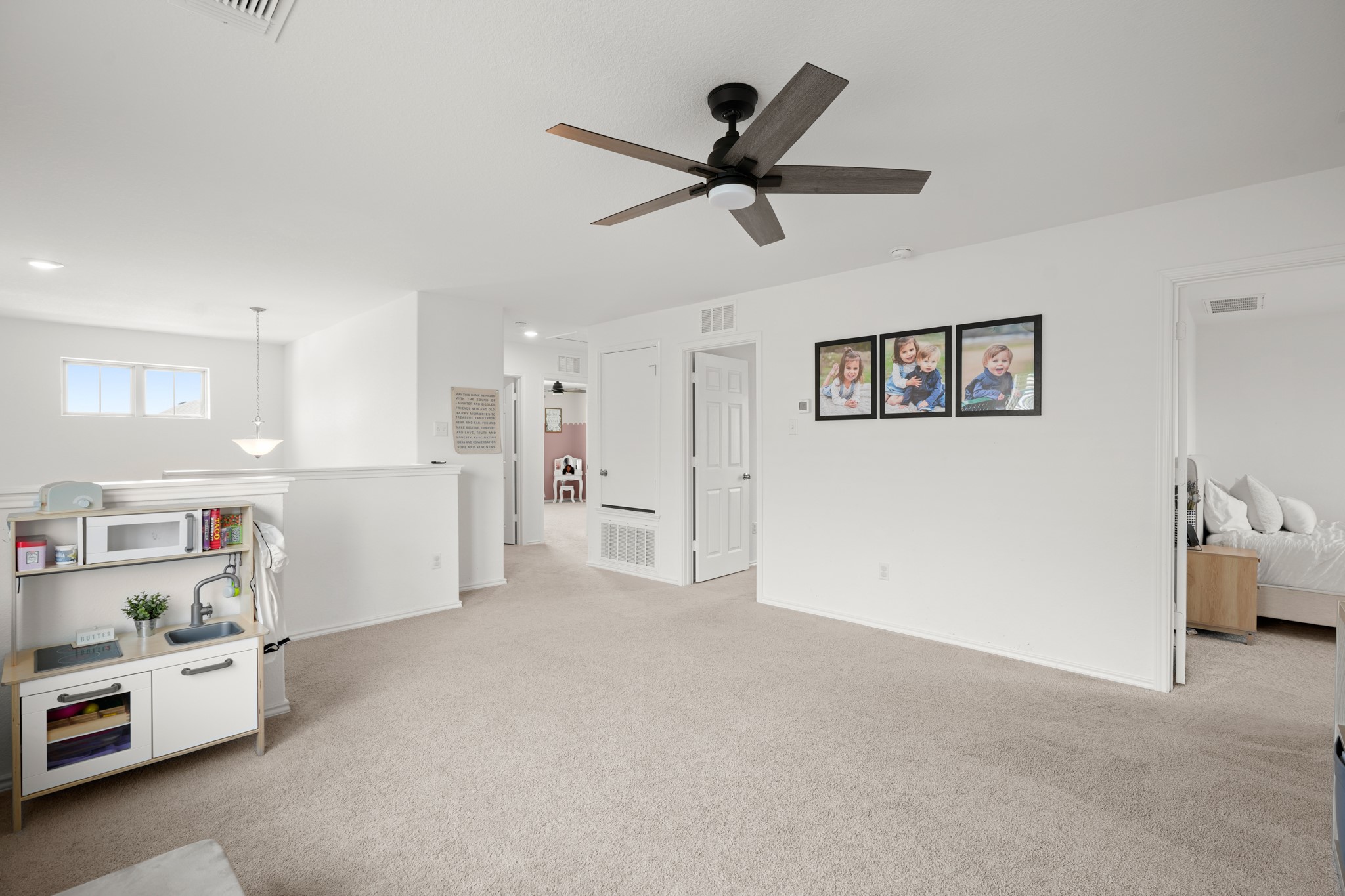 500 Pickrell Loop Georgetown, TX 78628 - Photo 11 of 29 a view of a livingroom with furniture and a ceiling fan