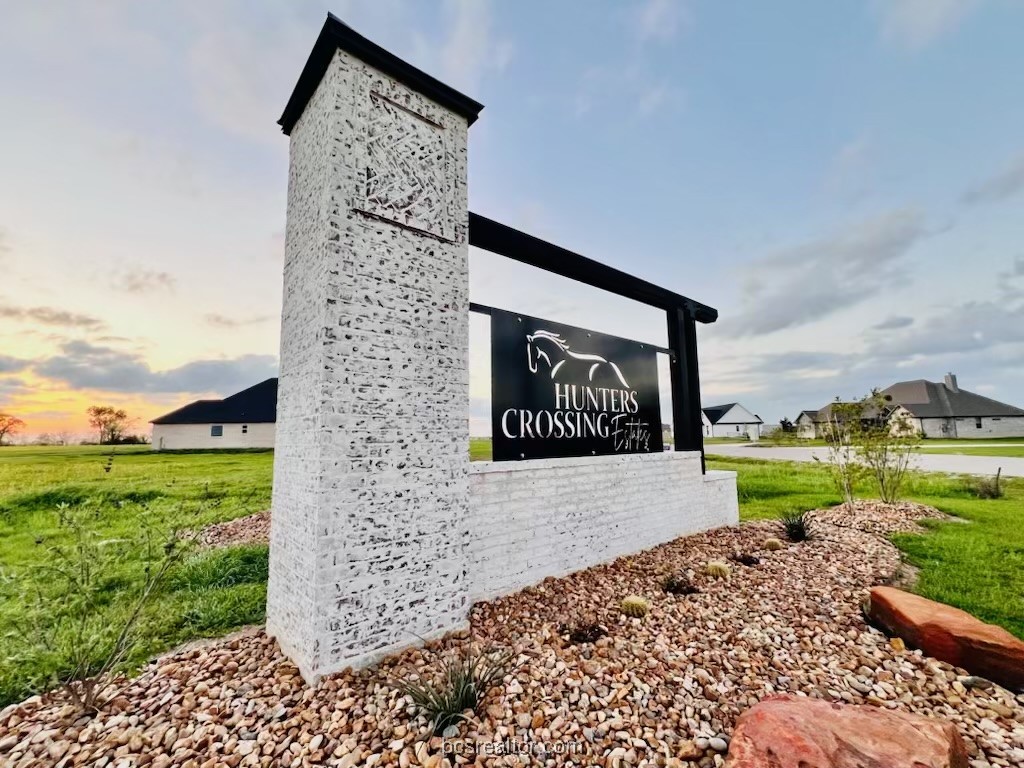 3522 Hunters Crossing Trail Bryan, TX 77808 - Photo 6 of 11 a sign board with a yard