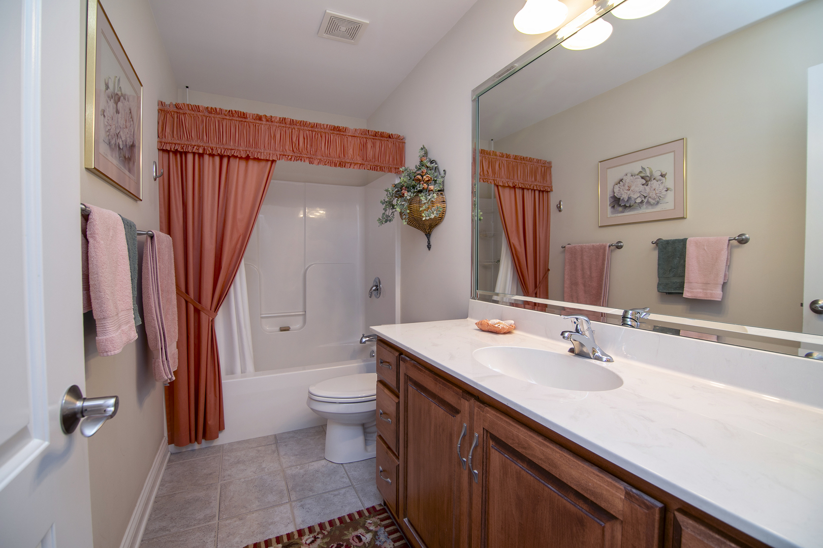 318 Maple Street Beecher, IL 60401 - Photo 14 of 27 a bathroom with a sink a toilet and shower