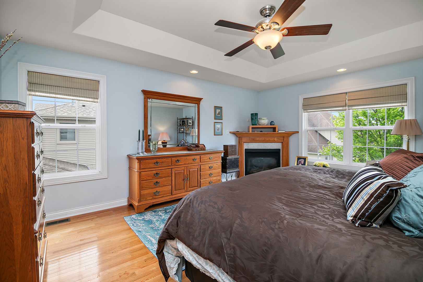 318 Maple Street Beecher, IL 60401 - Photo 16 of 27 a bed room with a bed and a dresser