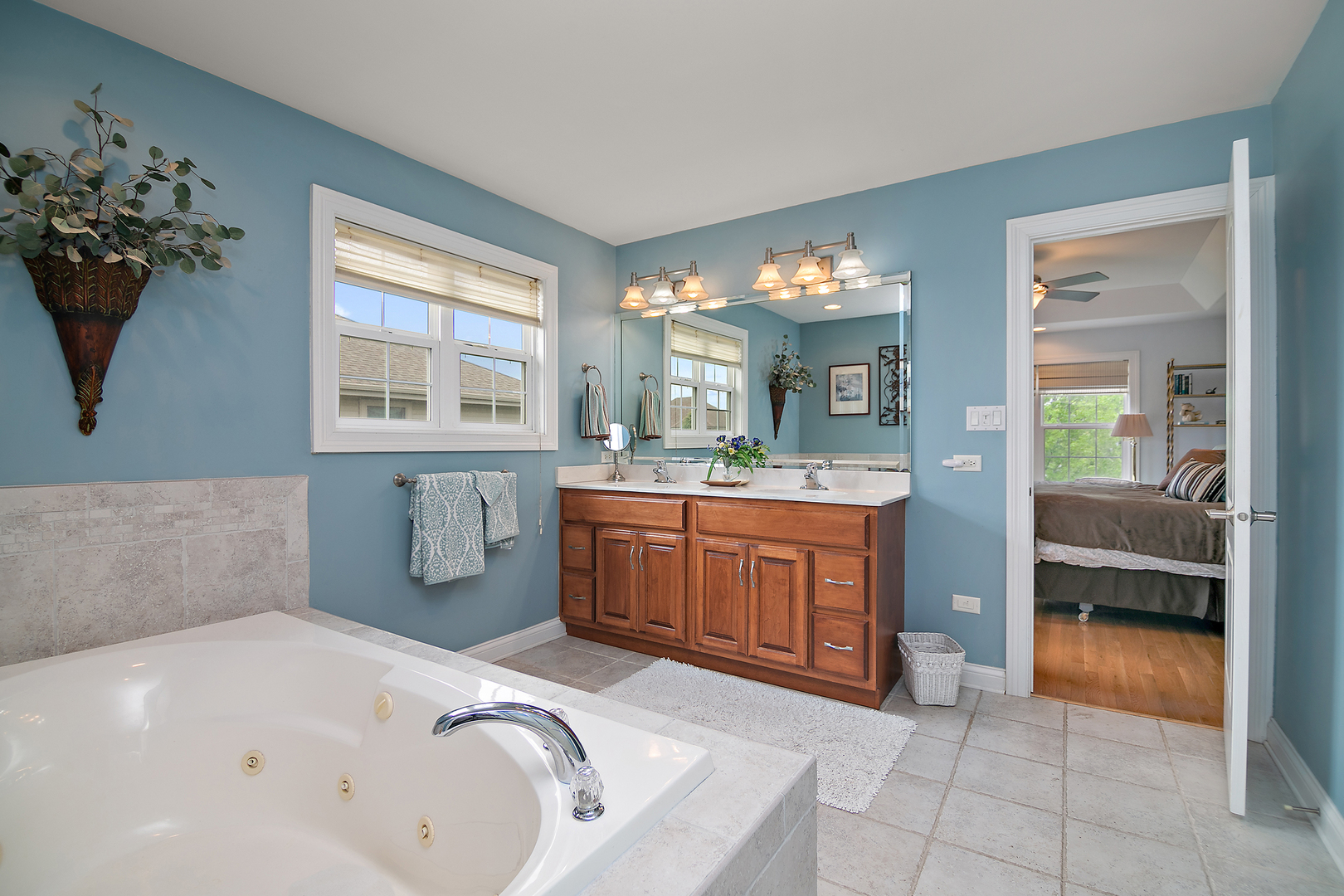 318 Maple Street Beecher, IL 60401 - Photo 20 of 27 a spacious bathroom with a tub sink and mirror