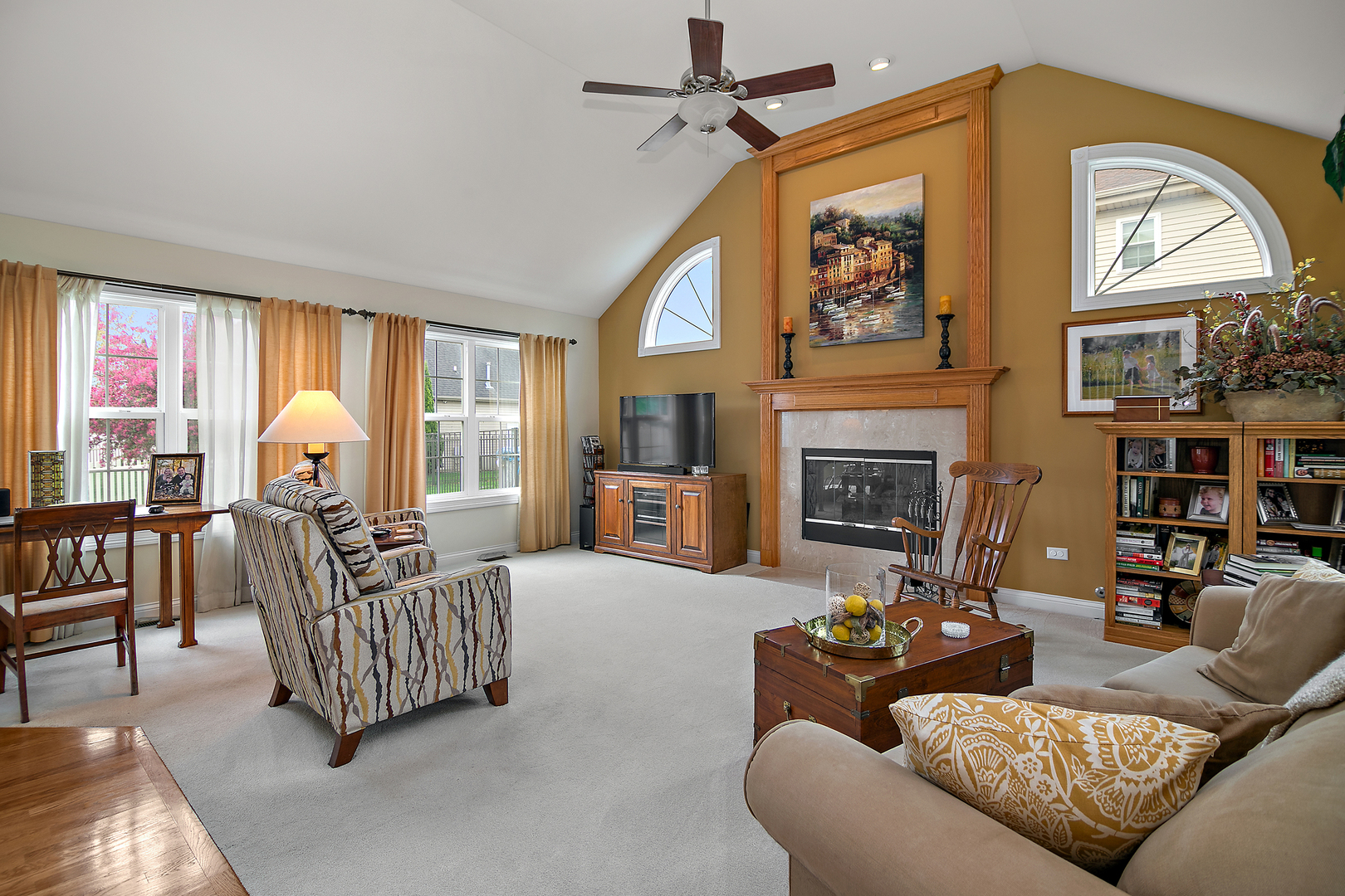 318 Maple Street Beecher, IL 60401 - Photo 2 of 27 a living room with furniture a fireplace and a large window