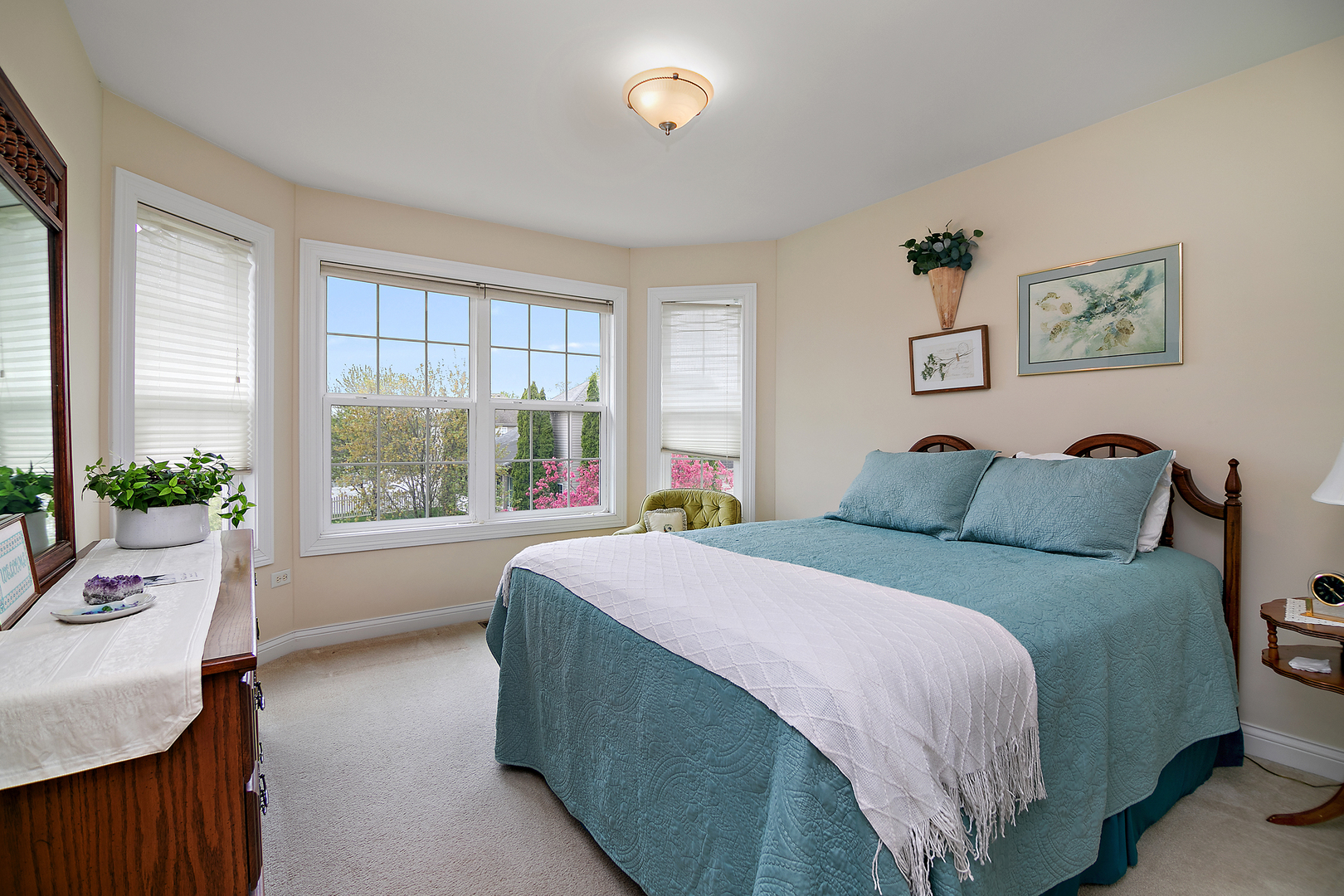318 Maple Street Beecher, IL 60401 - Photo 22 of 27 a bed sitting in a bedroom next to a window