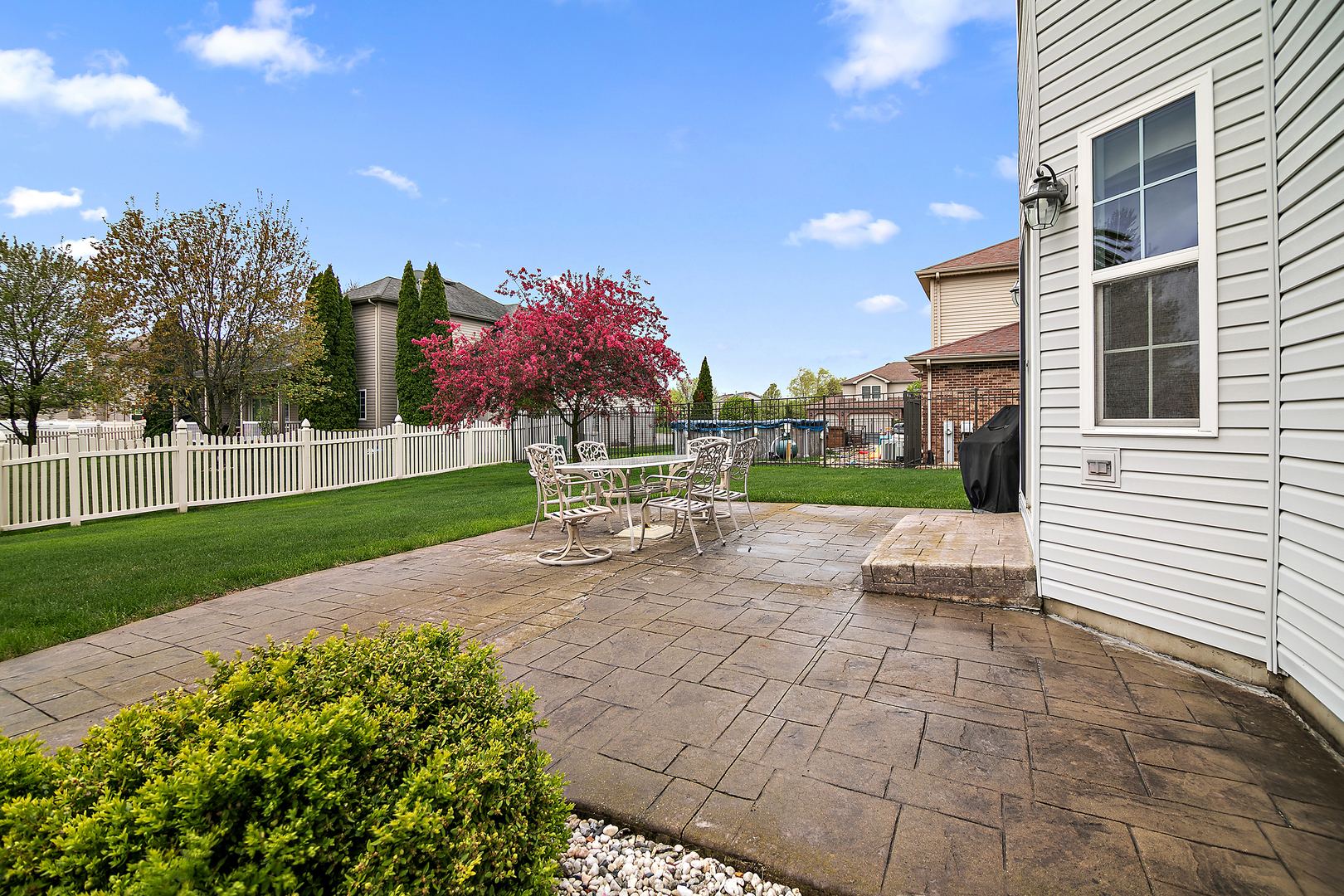 318 Maple Street Beecher, IL 60401 - Photo 27 of 27 a view of a house with a yard and sitting area