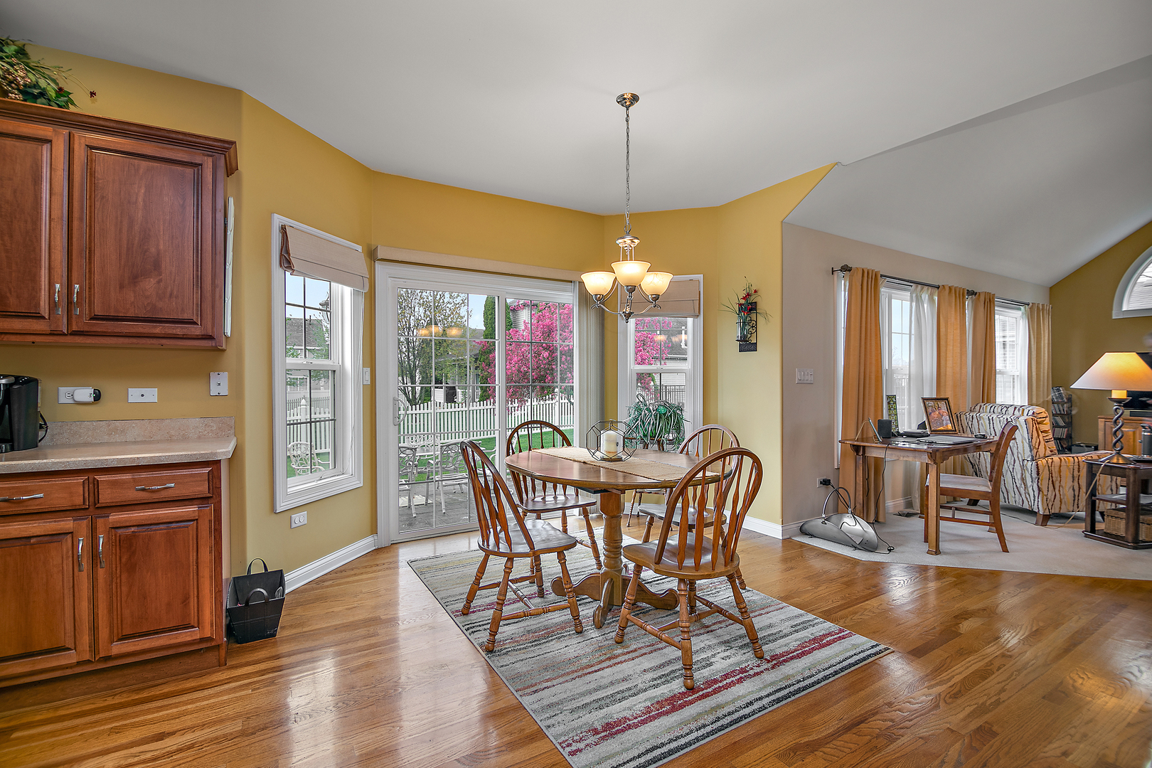 318 Maple Street Beecher, IL 60401 - Photo 4 of 27 a view of a dining room with furniture window and wooden floor