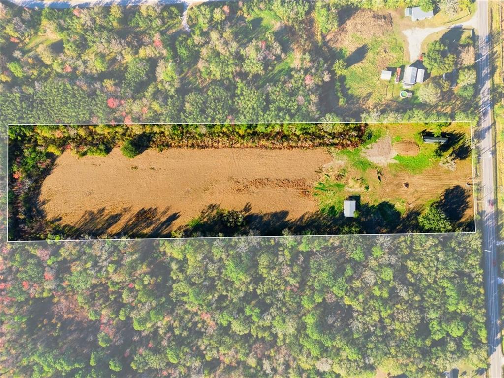 2016 Thornhill Road Auburndale, FL 33823 - Photo 10 of 15 a view of a lake with a yard