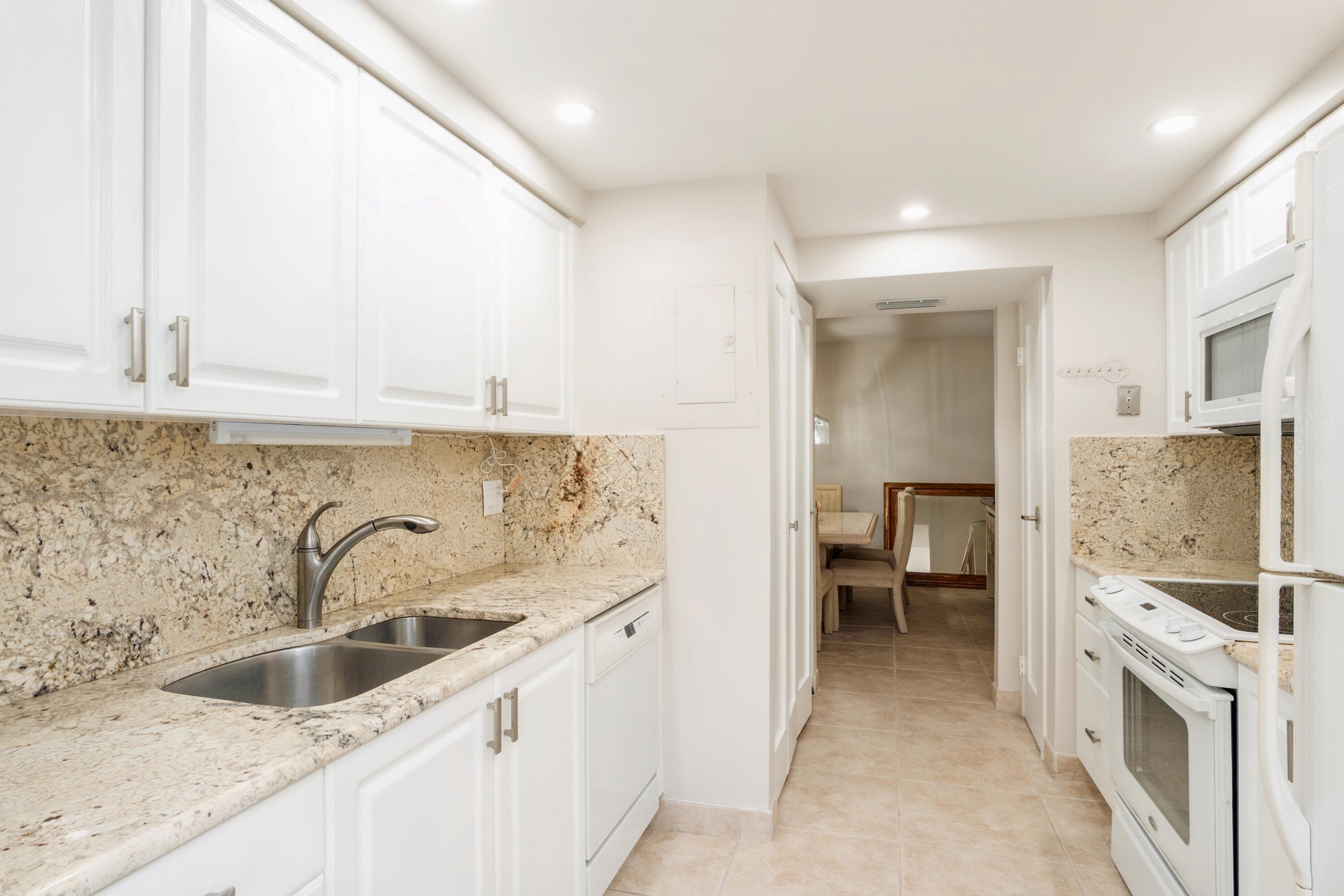 3200 South Ocean Boulevard, Unit B104 Palm Beach, FL 33480 - Photo 4 of 24 06_104B_5_Kitchen_HiRes