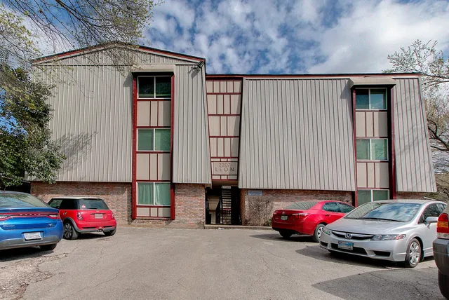 a car parked in front of a house