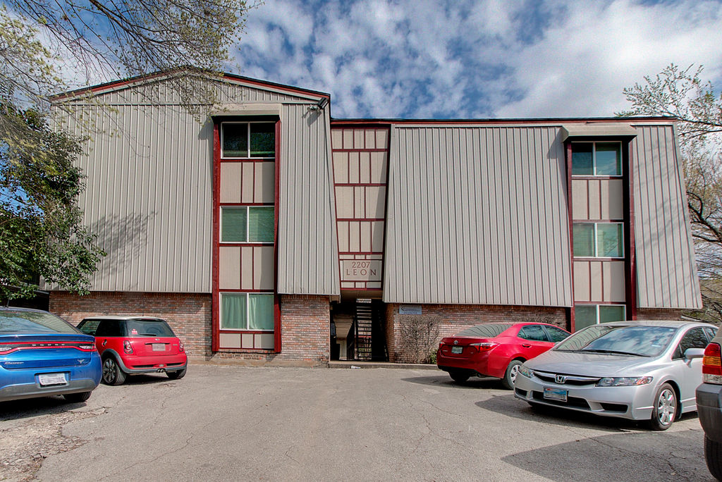 a car parked in front of a house