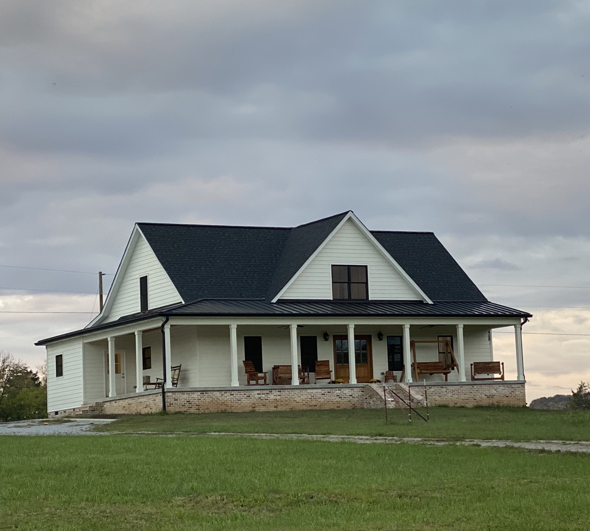 1333 County Line Road Watertown, TN 37184 - Photo 1 of 19 a front view of a house with a garden