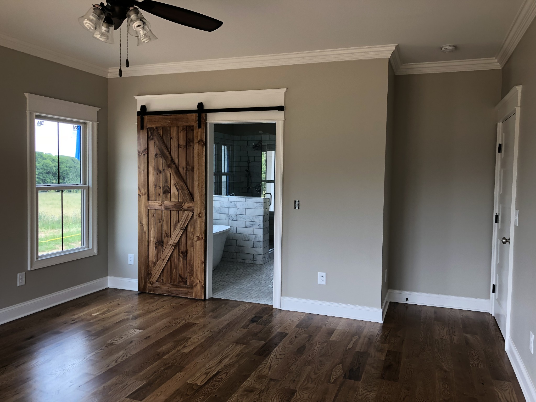 1333 County Line Road Watertown, TN 37184 - Photo 7 of 19 an empty room with wooden floor closet and windows